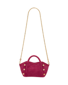 Magenta suede convertible min bag with gold accents on a white background