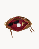 Interior view of a brown cross body bag with gold accents on a white background