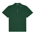 Green polo shirt with a brand logo on a white background