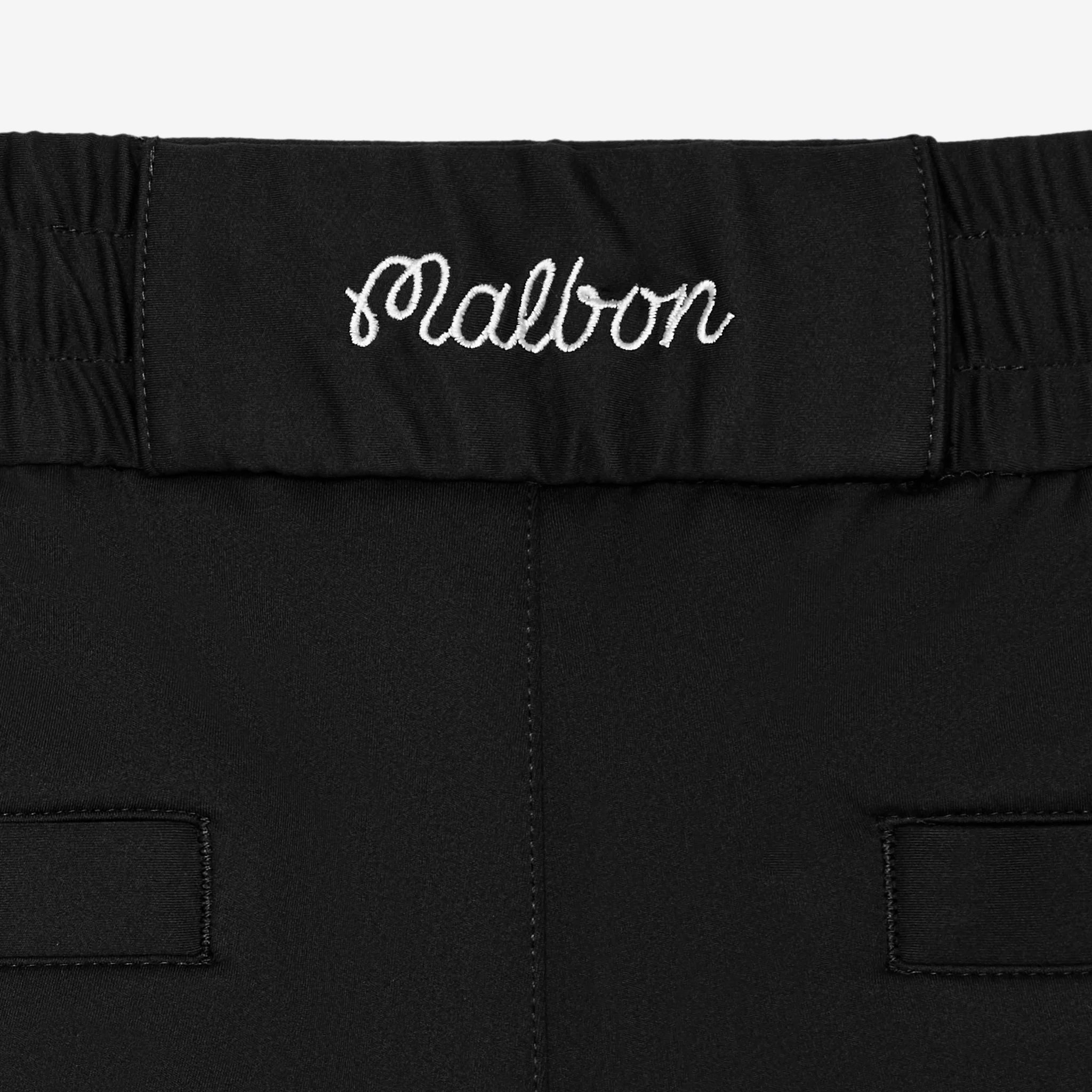 Black pants with 'Malbon' branding on a white background