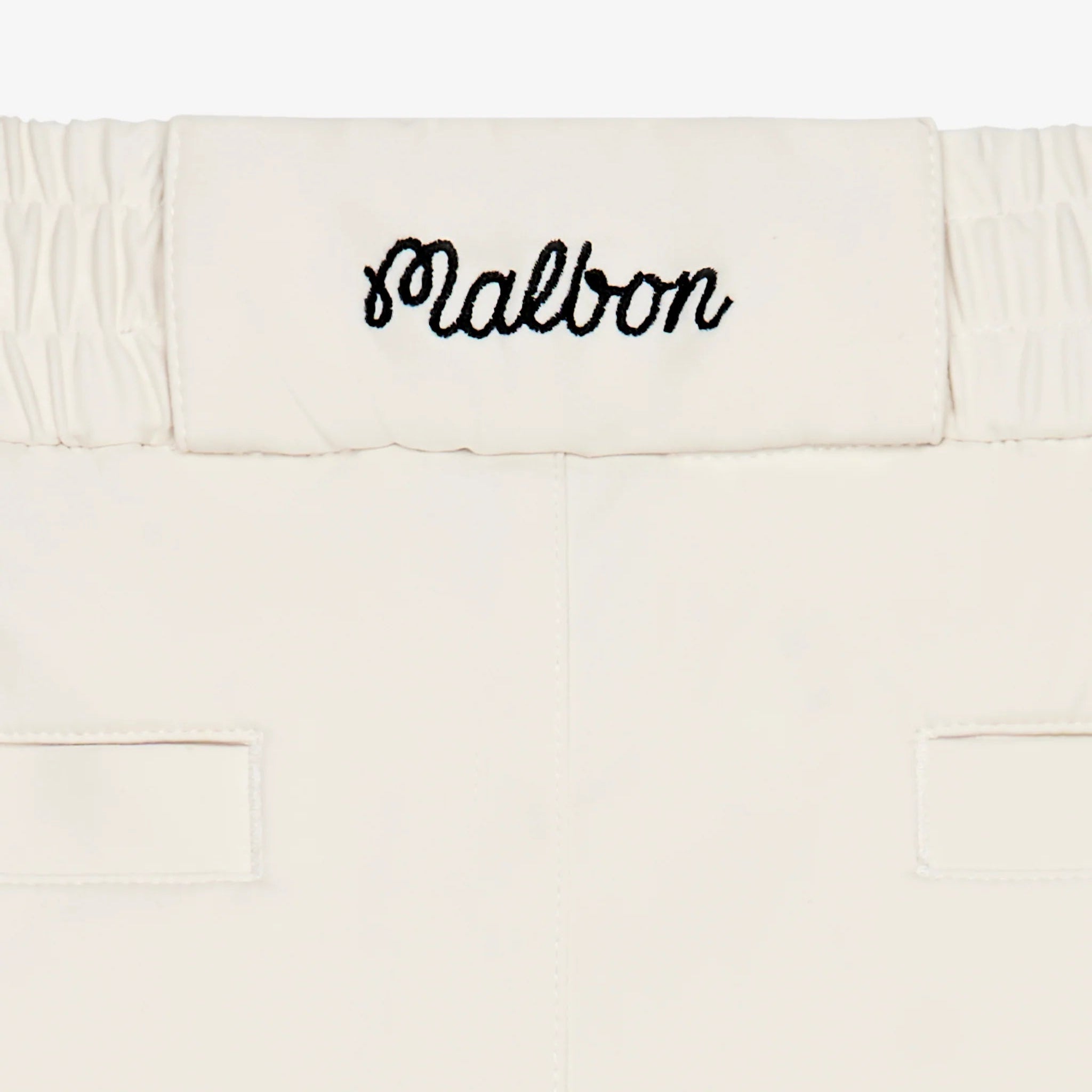 White back waistband with 'Malbon' branding on a white background