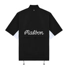 Black jacket with 'Malbon' branding on a white background