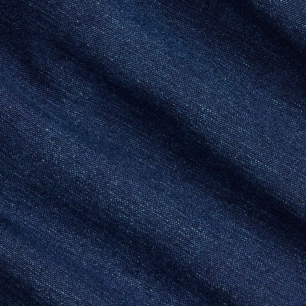 Close-up of dark blue fabric with visible texture