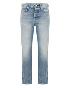 Light blue jeans on a white background