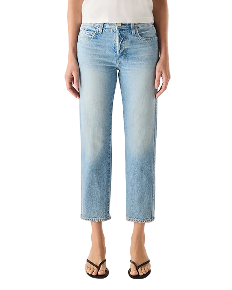 Person wearing a white t-shirt and light blue jeans on a white background