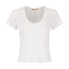 White t-shirt with 'Zara' branding on a white background