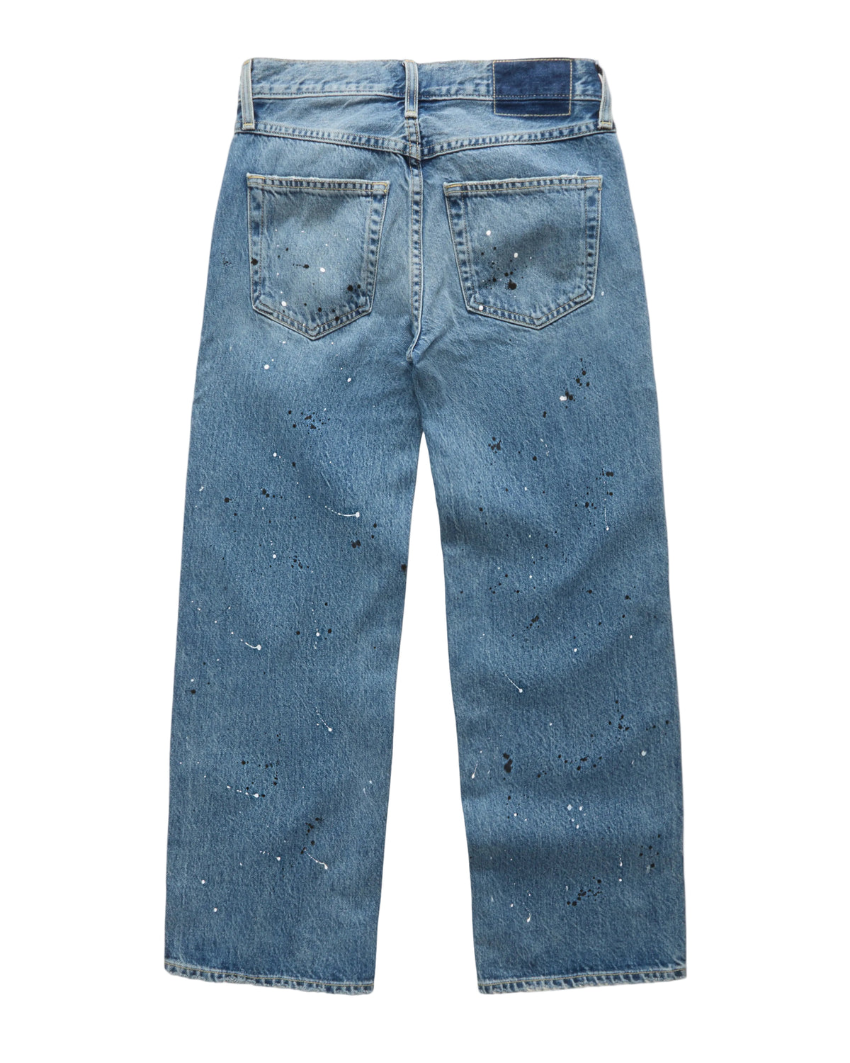 Back view of light blue denim jeans with a paint splatter details, shown flat on a white background.