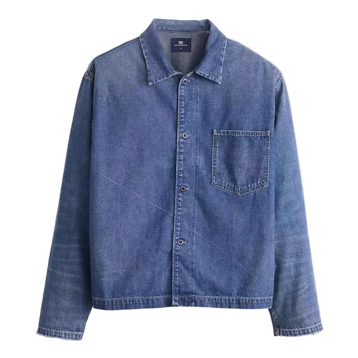 Blue denim jacket on a white background