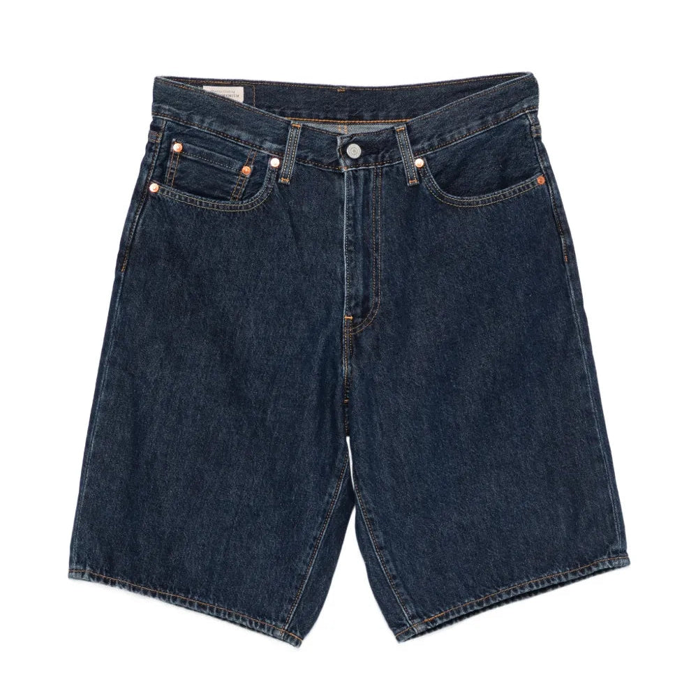 Pair of blue denim shorts on a white background