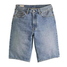 Blue denim shorts on a white  background
