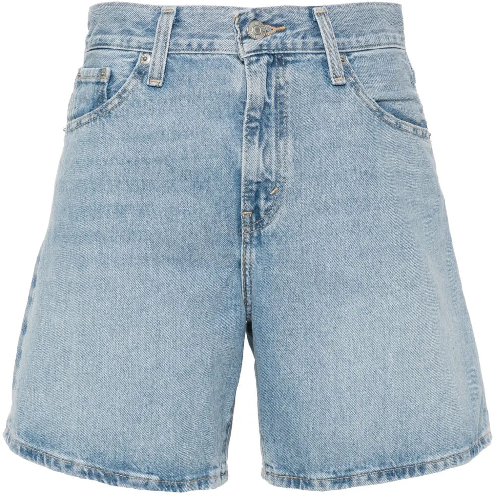 Light blue denim shorts on a white background