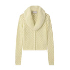 Cream-colored knitted cardigan on a hanger against a white background