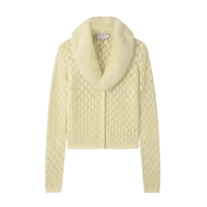 Cream-colored knitted cardigan on a hanger against a white background
