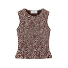 Zebra patterned top on a white background