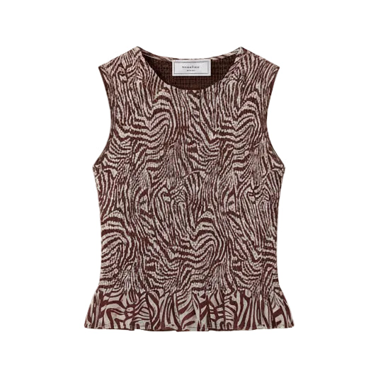 Zebra patterned top on a white background