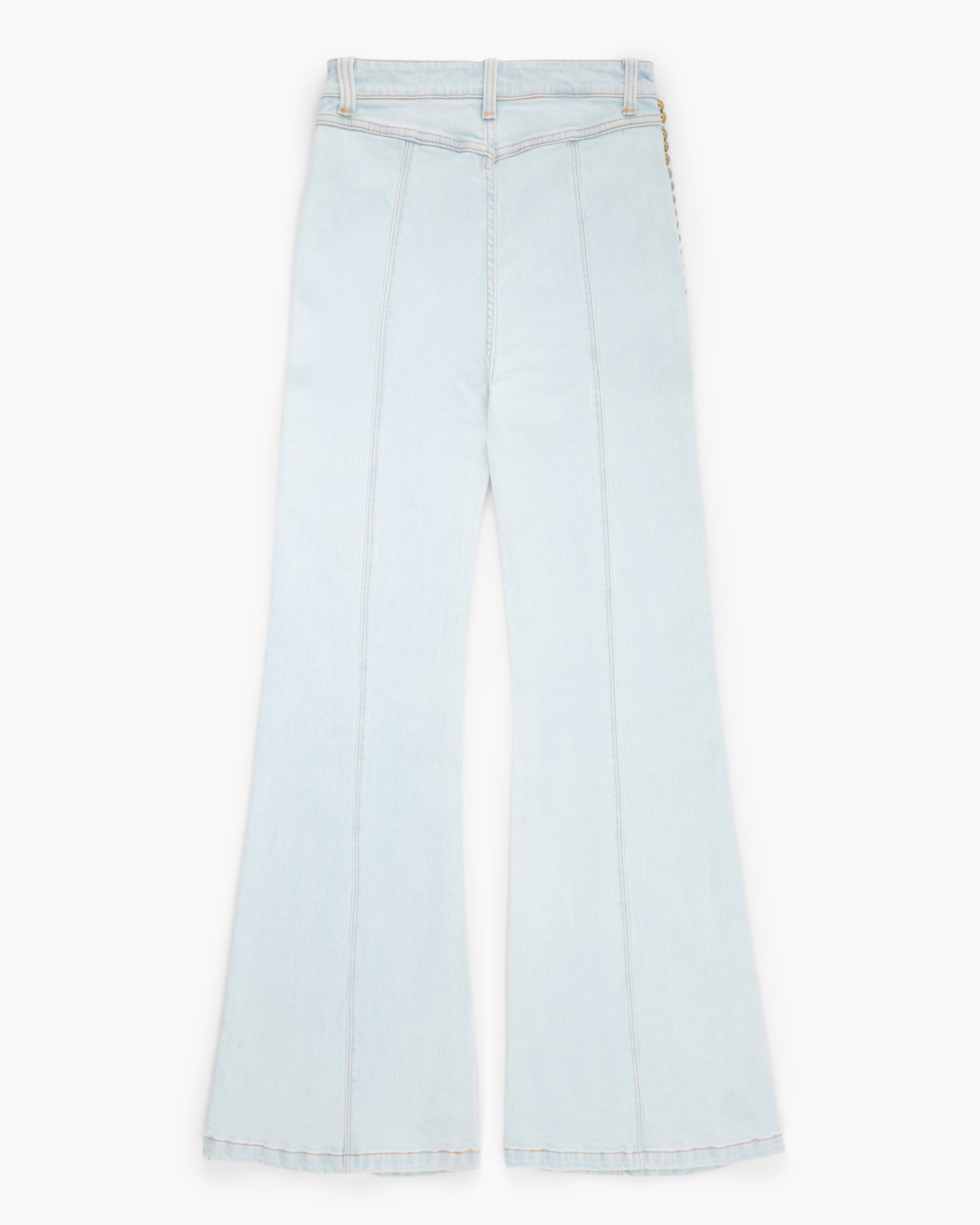 Light blue bell-bottom jeans on a white background