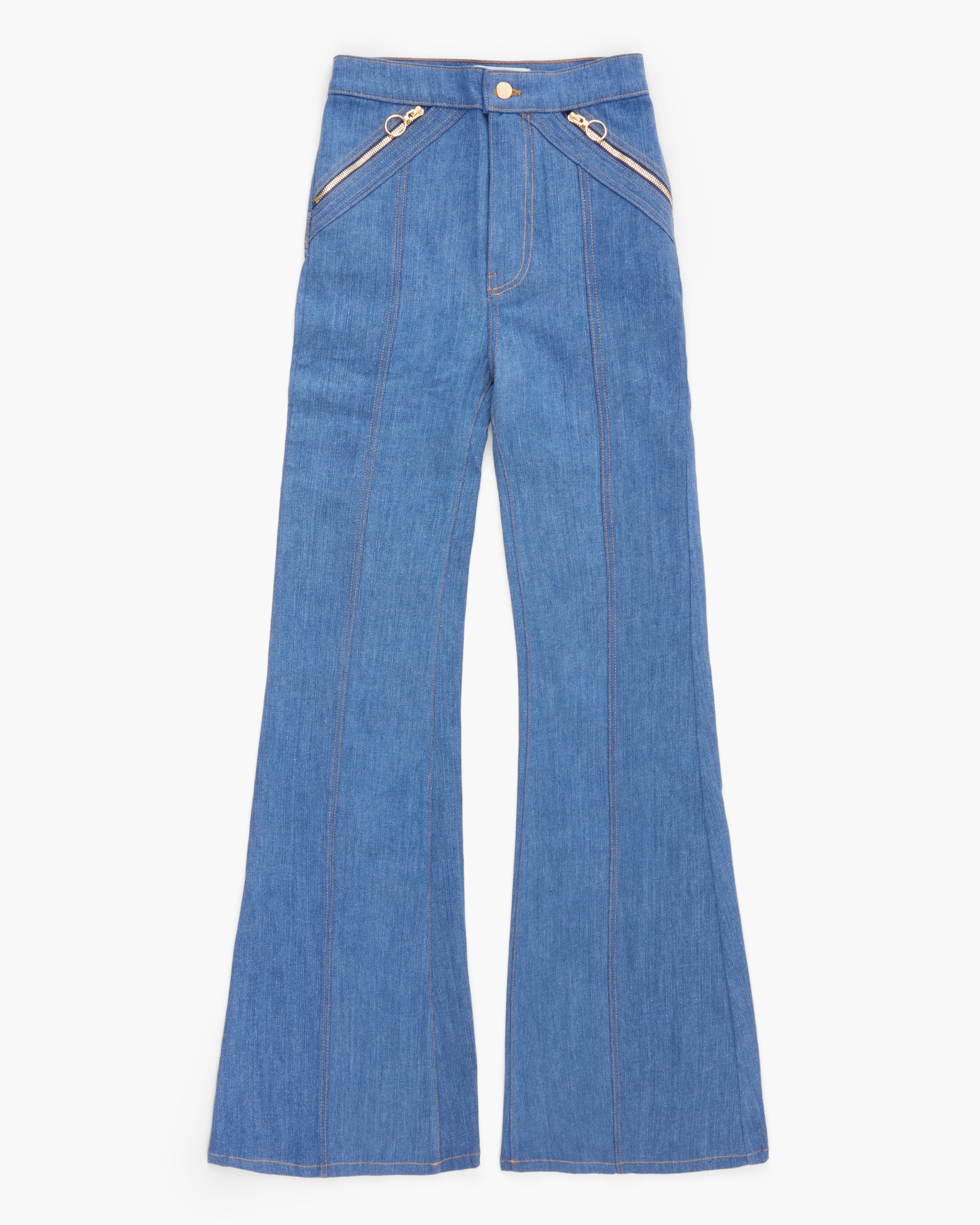 Blue denim flared pants on a white background