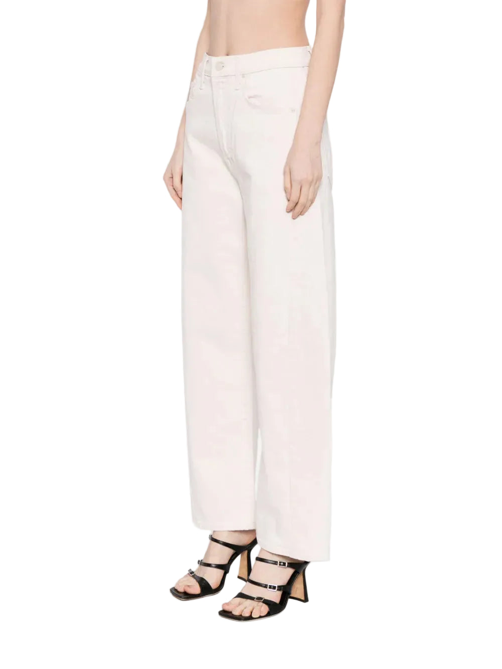 White pants worn by a person on a white background