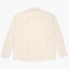 Back view of a cream button down shirt on a white background
