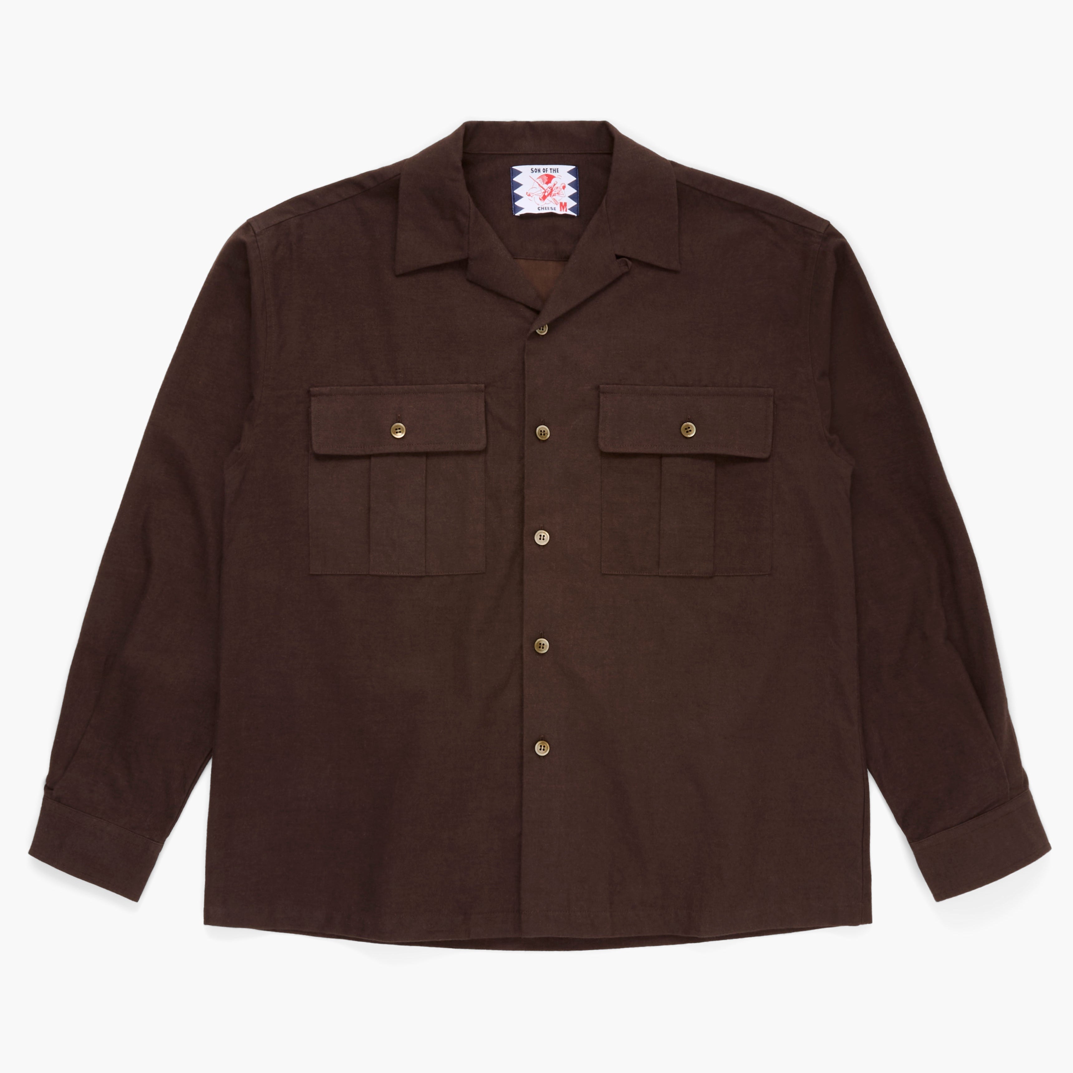 Brown button down shirt on a white background