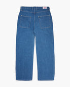 Wide leg blue jeans on a white background