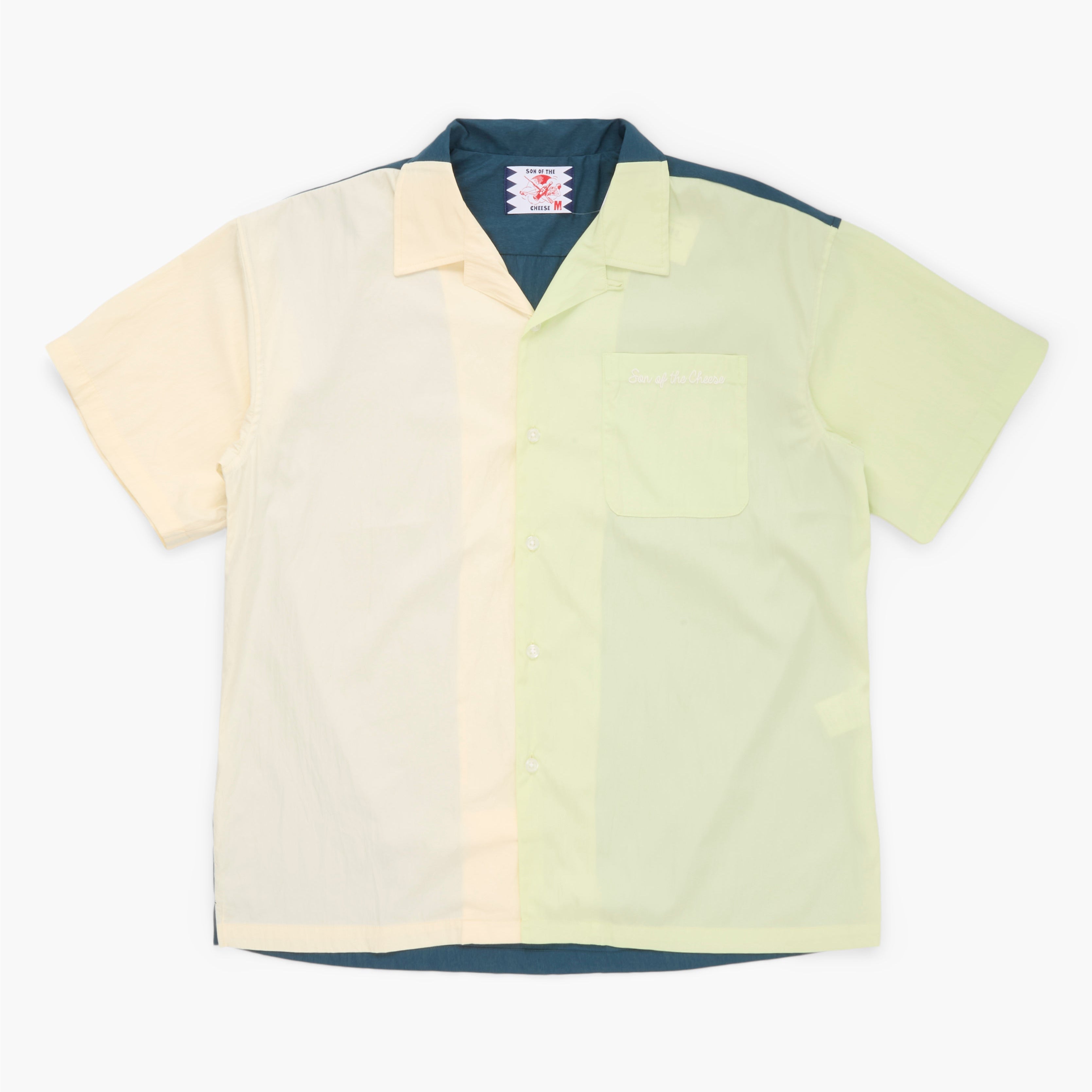 Lime, yellow and green short sleeve button down shirt on a white background