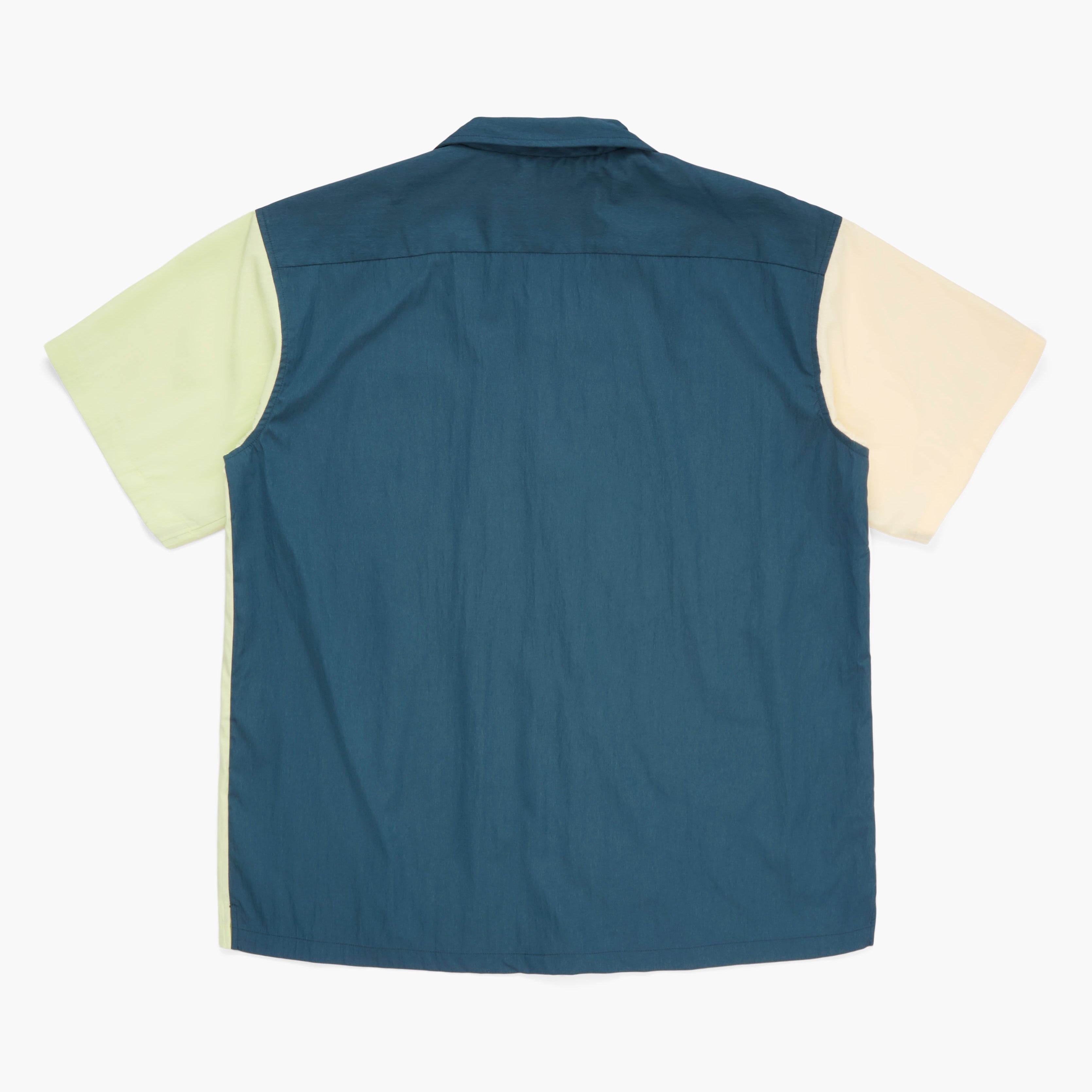 Back view of a lime, yellow and green short sleeve button down shirt on a white background
