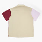 Back view of a maroon, violet, and tan short-sleeved button-down shirt on a white background