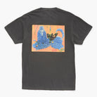 Black t-shirt with colorful artwork printed on the back on a white background