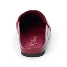 Back view of a glossy red leather penny loafer mule on a plain white background.