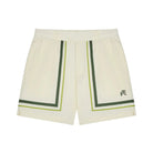 Off-white athletic shorts with dark green and lime green border stripes on the sides and a small black embroidered monogram logo on the lower right leg, shown flat on a white background.