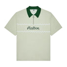 Green knit polo with an embroidered 'Malbon' logo across the chest on a white background
