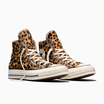Leopard print high top Converse on a white background