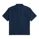 A short-sleeve button-up shirt in dark navy blue with a small white geometric dot pattern, shown from the back on a plain white background.