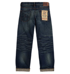 Back view of a pair of dark blue jeans with a visible brand label on a white background