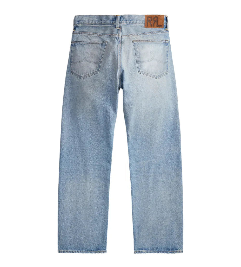 Light blue denim jeans shown from the back, featuring a brown leather patch with 'RRL' branding on the back waistband, set against a plain white background.