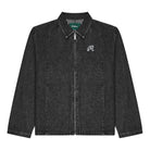 A dark black denim jacket with a vertical textured stripe pattern, featuring a white embroidered script 'M' logo on the left chest and a silver-tone zipper.