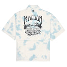 A short-sleeve collared windbreaker with a light blue and white tie-dye pattern, featuring a large black graphic print on the front with the word 'MALBON' and a mountain landscape design.