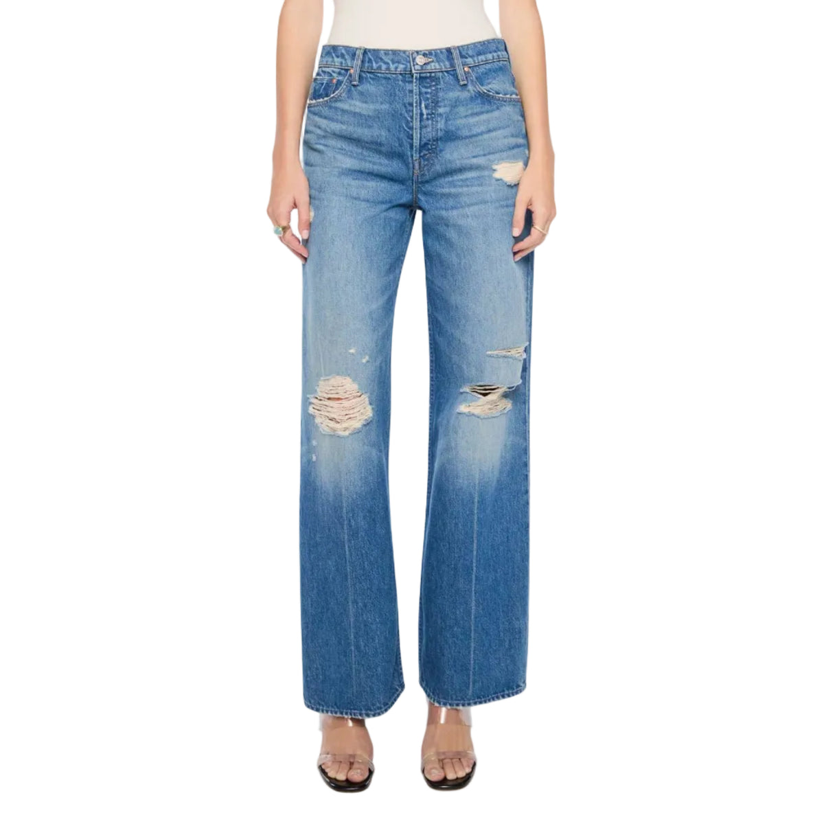 A woman modeling a pair of high-waisted, wide-leg blue jeans with distressed details and a faded wash, against a plain white background.
