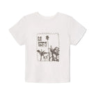 A white short-sleeve crewneck t-shirt featuring a vintage-style postage stamp graphic on the front with palm trees and the text 'LA VISION'.
