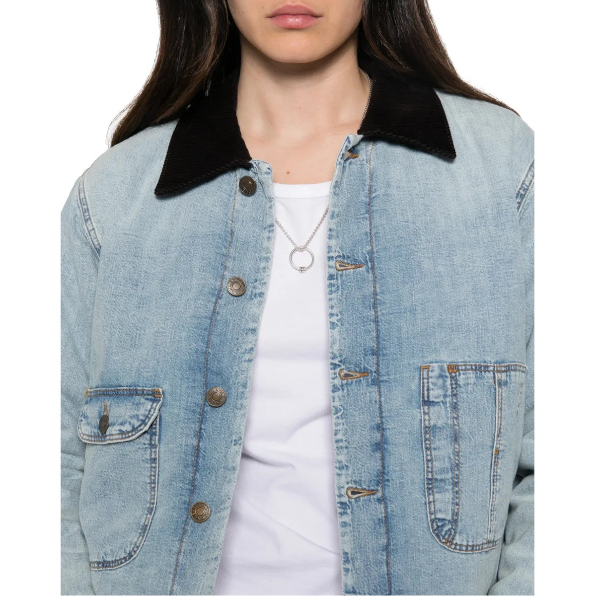Close-up of the Canyon Jacket worn open over a white T-shirt, showing the corduroy collar, metal buttons and front patch pockets.