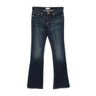 RE/DONE Comfort Stretch Micro Boot Jean laid flat. Dark indigo low-rise bootcut jeans with whiskering and fading.