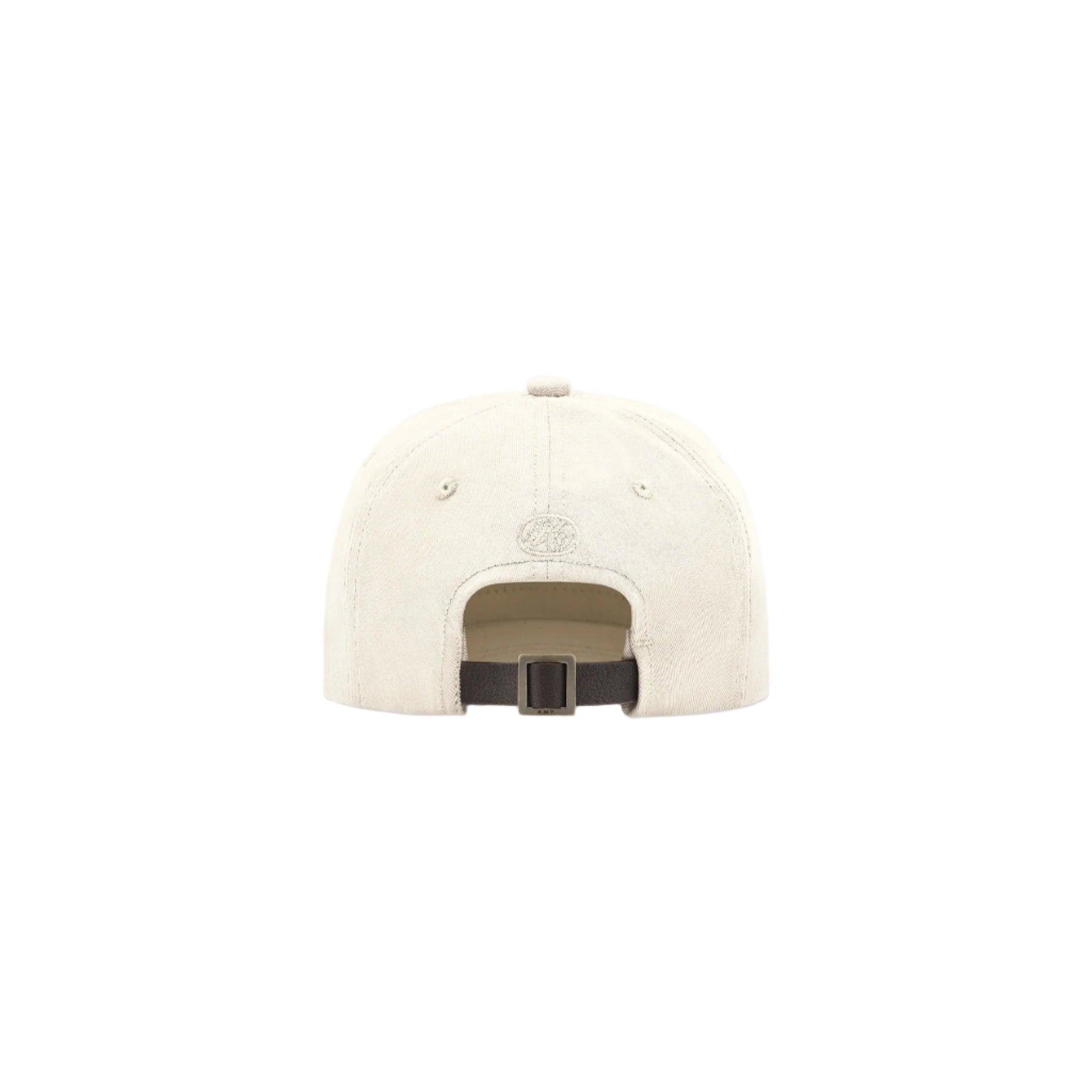 Beige cap with a black buckle on a white background