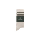 Pair of socks with a brand label on a white background
