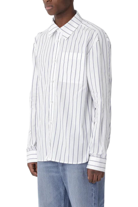 Man wearing a white striped shirt and blue jeans on a white background