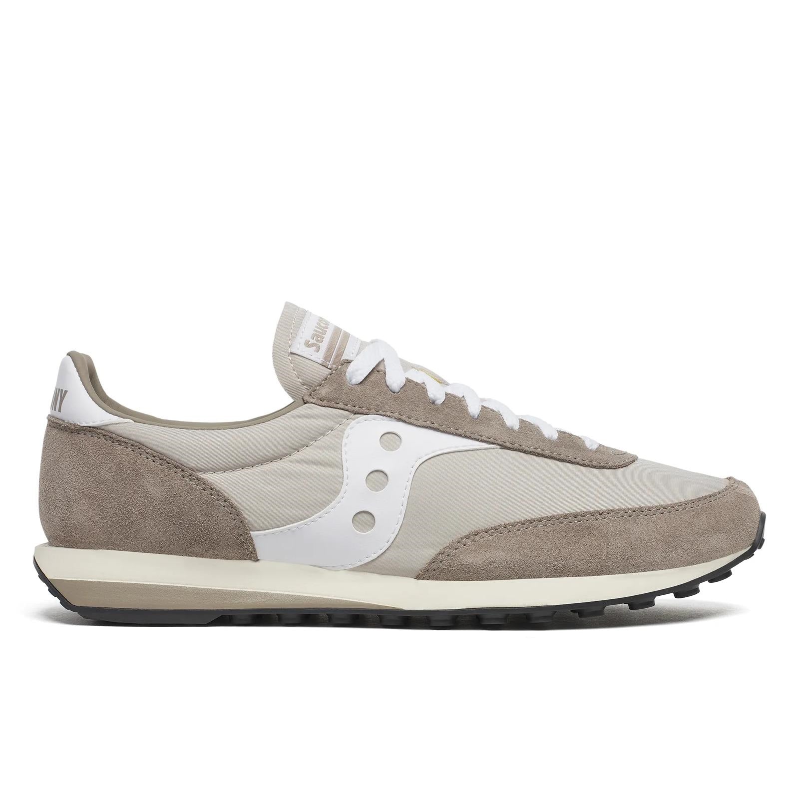 Beige and white sneaker with brand logo on a white background