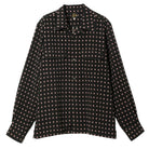 Black patterned shirt on a white background