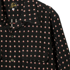 Black patterned jacket with a brand logo on a white background