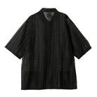 Black textured shirt on a white background