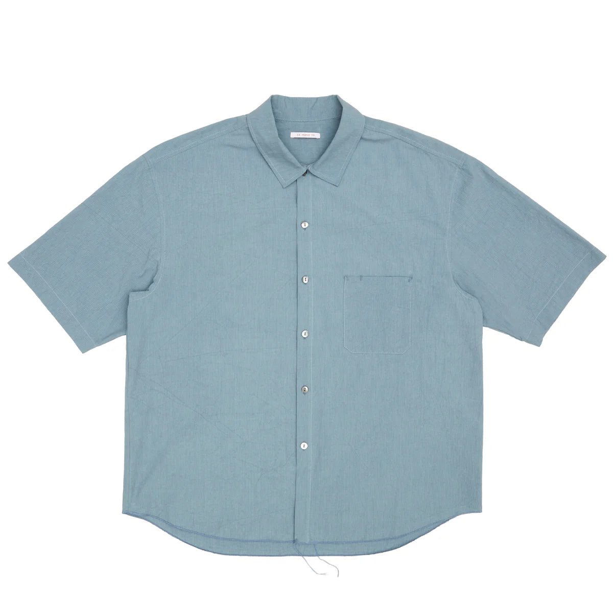 Light blue short-sleeve shirt on a white background